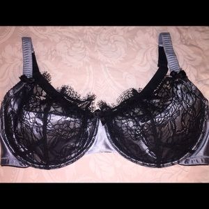 Cacique light blue and black lacy bra.